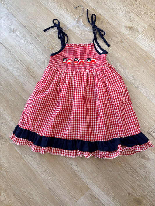 Red smocked gingham ruffle dress