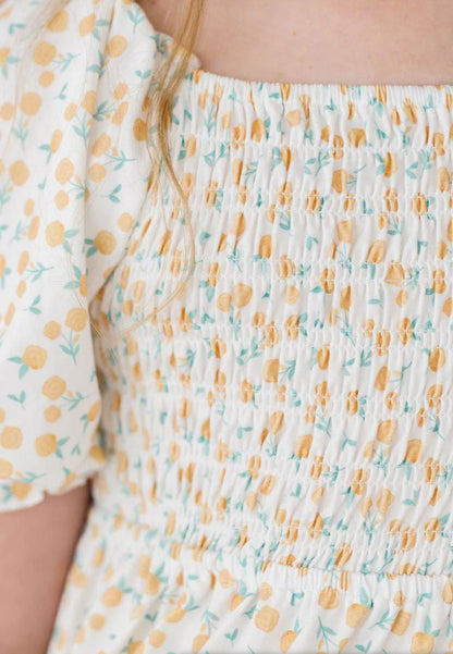 Marvelous marigolds smocked ruffle dress